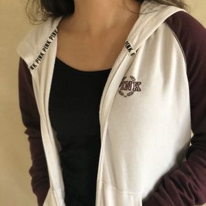 A pink brand sweater